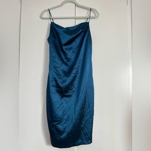 Emerald-colored satin dress